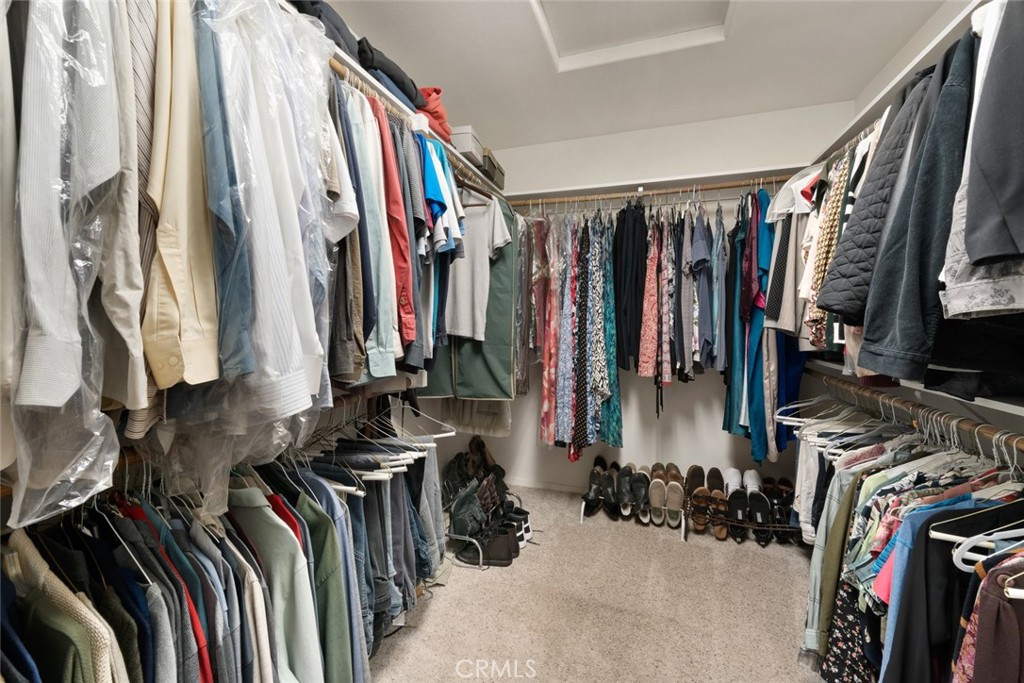 225 Broken Arrow Road Nipomo, CA 93444 - Photo 40 of 75 a view of walk in closet with clothes