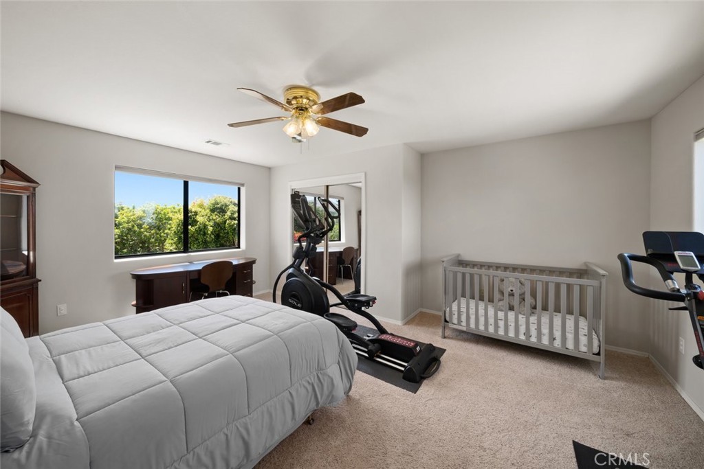 225 Broken Arrow Road Nipomo, CA 93444 - Photo 45 of 75 a bedroom with a bed and a window