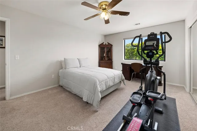 an aerial view of residential houses with outdoor space and street view