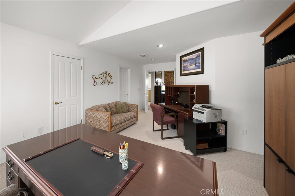 225 Broken Arrow Road Nipomo, CA 93444 - Photo 50 of 75 a living room with furniture and a flat screen tv