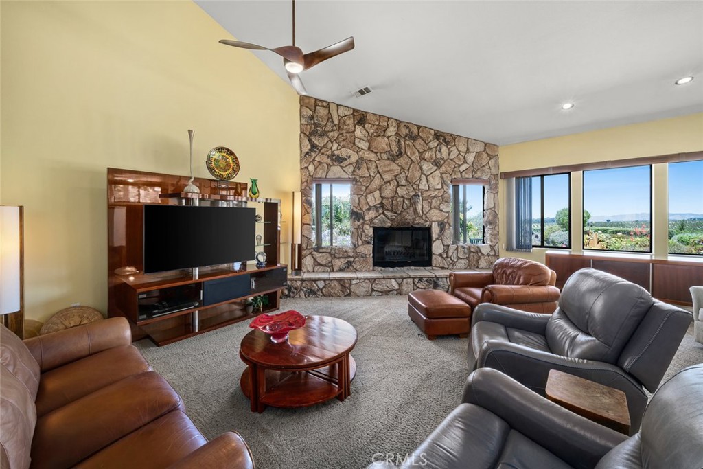 225 Broken Arrow Road Nipomo, CA 93444 - Photo 7 of 75 a living room with furniture and a flat screen tv