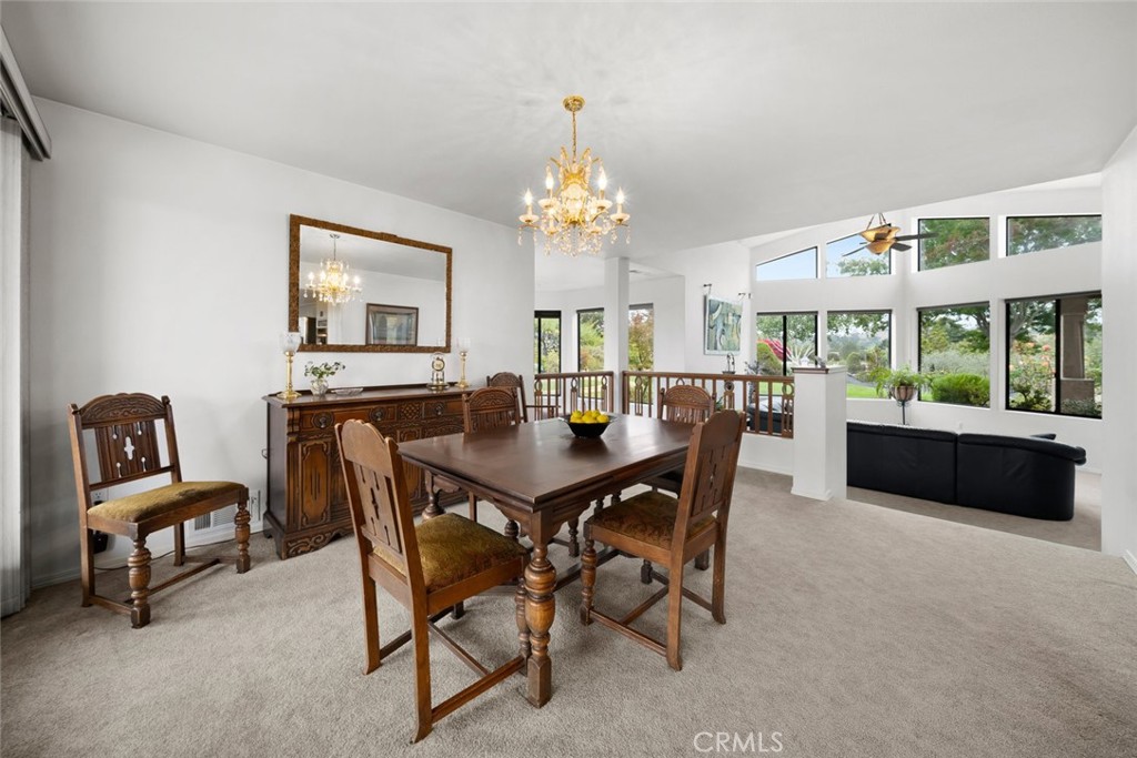225 Broken Arrow Road Nipomo, CA 93444 - Photo 8 of 75 a view of a dining room with furniture window and outside view
