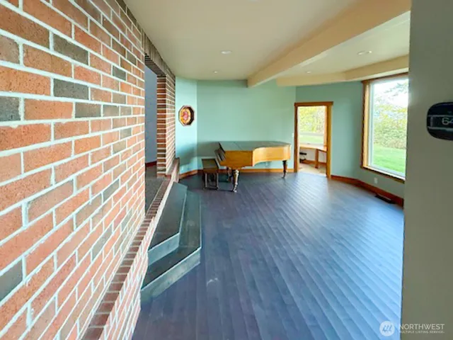 a view of livingroom with furniture and a window
