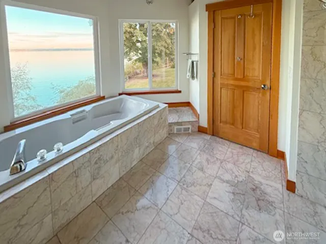 a view of front door with yard