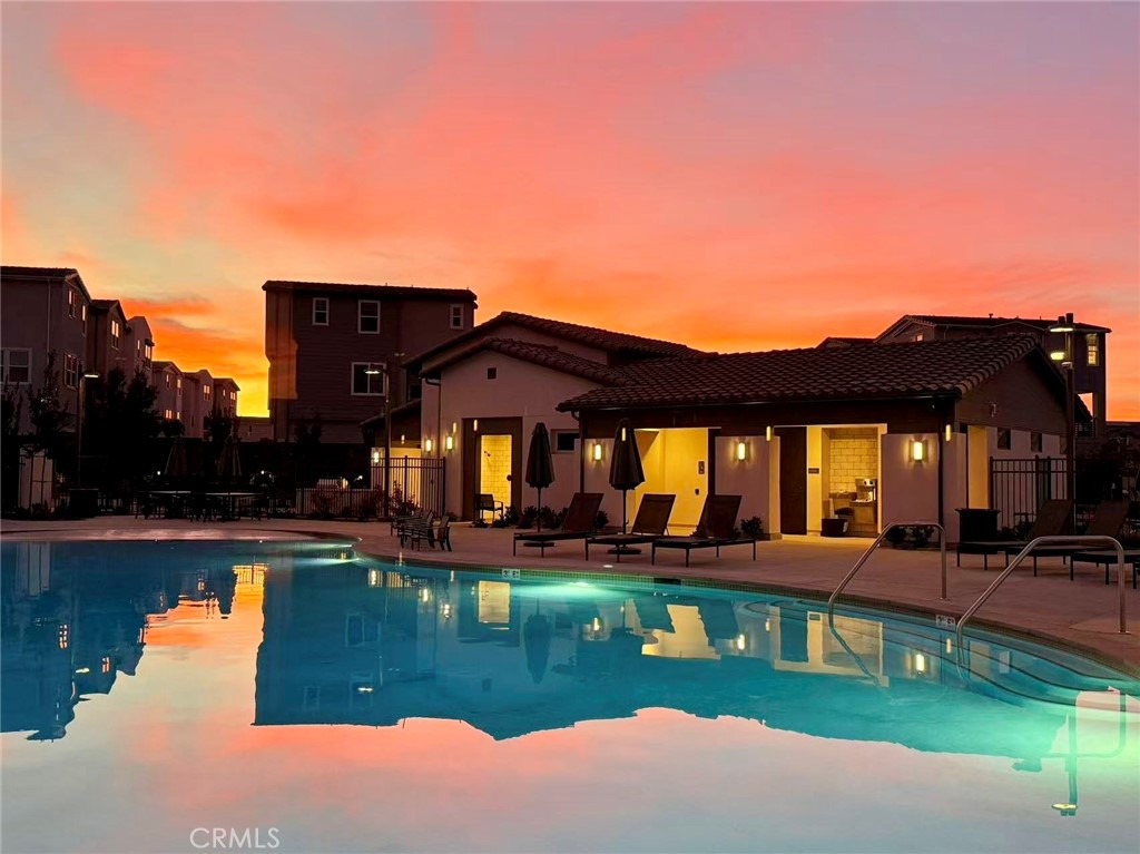 731 Jasper Street Rancho Mission Viejo, CA 92694 - Photo 6 of 14 a view of a house with pool and chairs