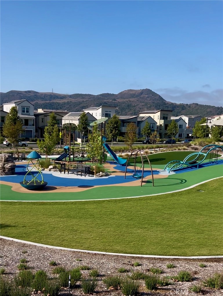 731 Jasper Street Rancho Mission Viejo, CA 92694 - Photo 7 of 14 a view of swimming pool with outdoor seating and yard