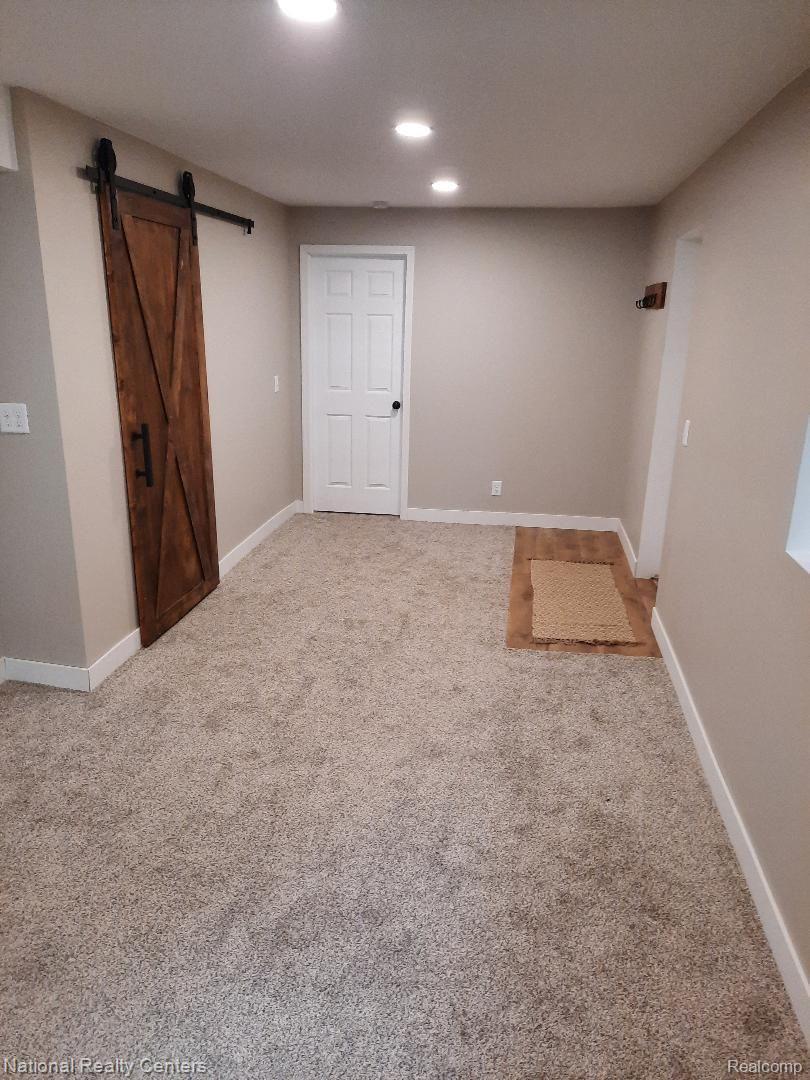 4823 Kokosing Road Hale, MI 48739 - Photo 54 of 54 family room/guest suite