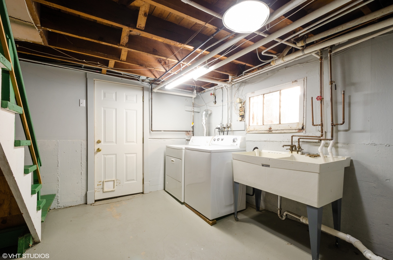 3016 Thayer Street Evanston, IL 60201 - Photo 15 of 20 a utility room with sink dryer and washer