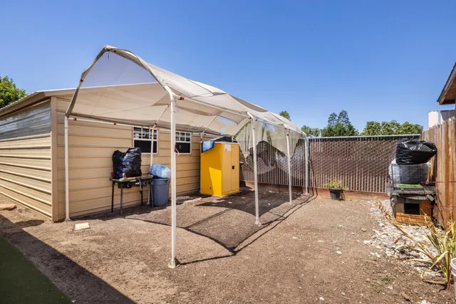 a view of a house with a patio