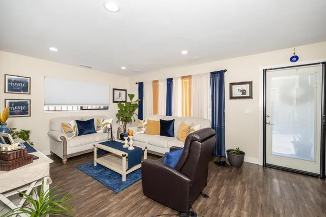 a living room with furniture or couch and a fireplace