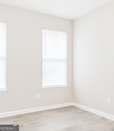 8596 Guthrie Drive Riverdale, GA 30274 - Photo 11 of 14 an empty room with a window