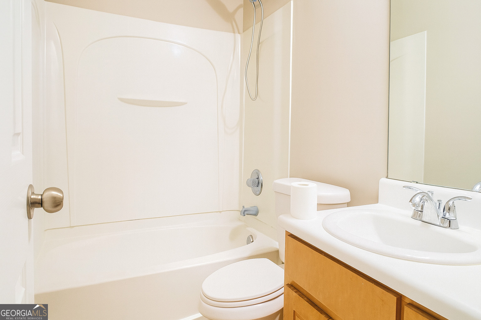 8596 Guthrie Drive Riverdale, GA 30274 - Photo 12 of 14 a bathroom with a sink toilet and shower