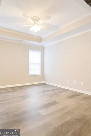 a view of an empty room and window