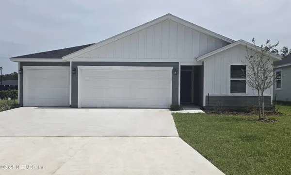 a front view of house with yard