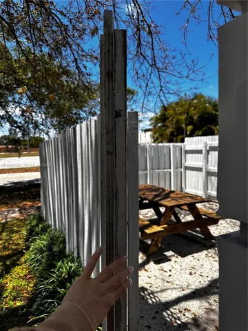 a view of a backyard of the house