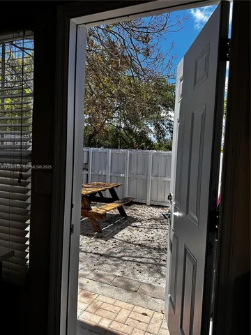 a view of swimming pool from a balcony