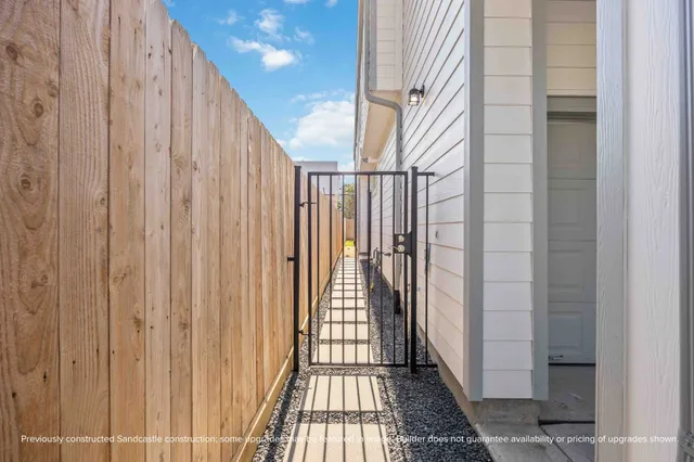 a view of a wooden floor and a window