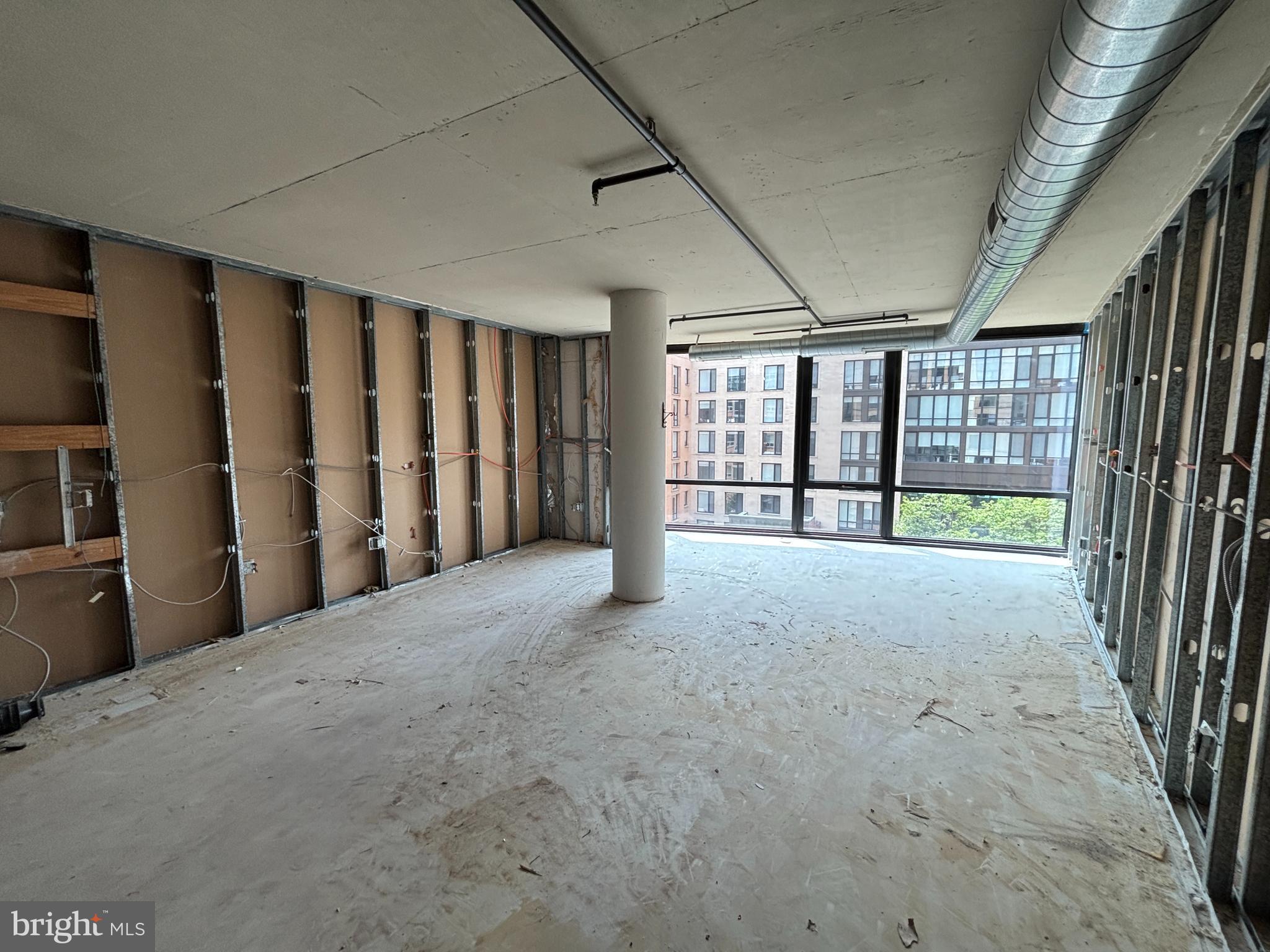 2125 14th Street Northwest, Unit 601 Washington, DC 20009 - Photo 20 of 22 a view of an empty room with a balcony