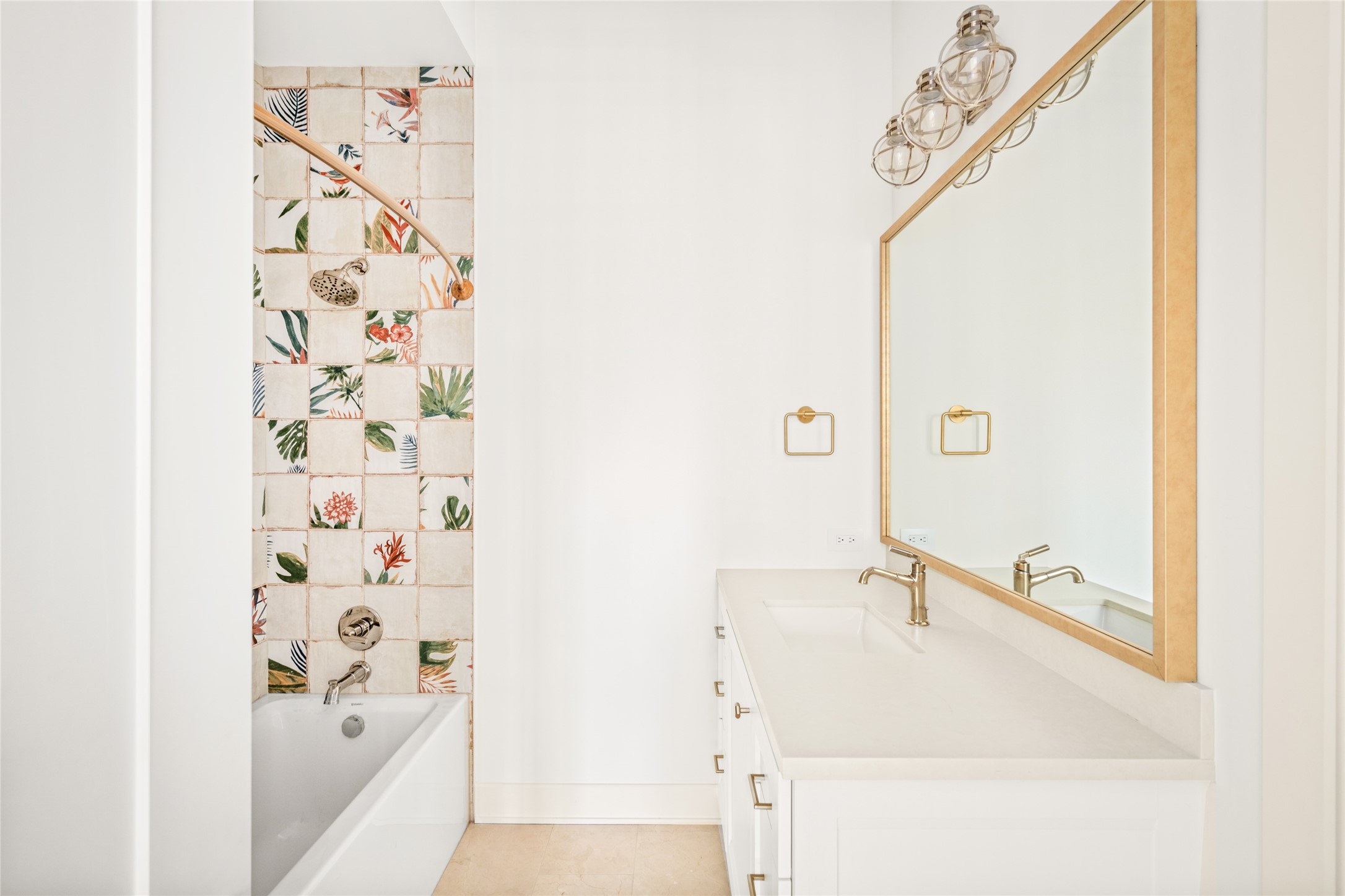 1136 Woodland Street Houston, TX 77009 - Photo 38 of 50 Elegant secondary bath finished with custom tilework, quality fixtures, and a clean, modern aesthetic.