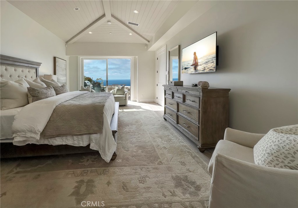 33971 Nauticus Isle Dana Point, CA 92629 - Photo 12 of 27 a bedroom with furniture and a flat screen tv