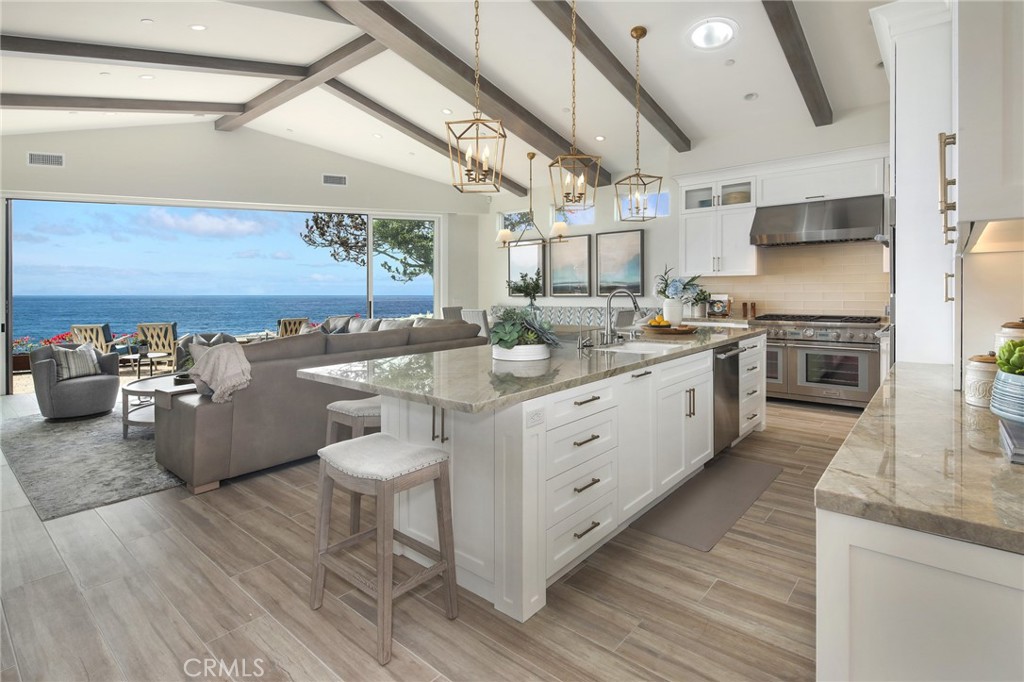33971 Nauticus Isle Dana Point, CA 92629 - Photo 8 of 27 a kitchen with a sink appliances and cabinets