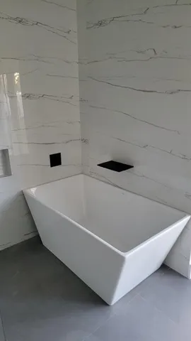 a bathroom with a bathtub
