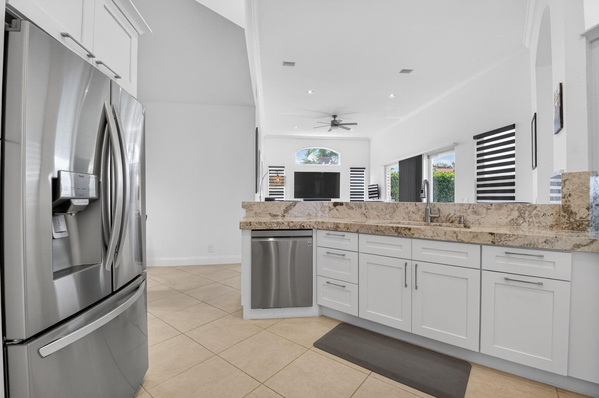 10078 Lexington Estates Boulevard Boca Raton, FL 33428 - Photo 23 of 49 a bathroom with a granite countertop sink mirror and double