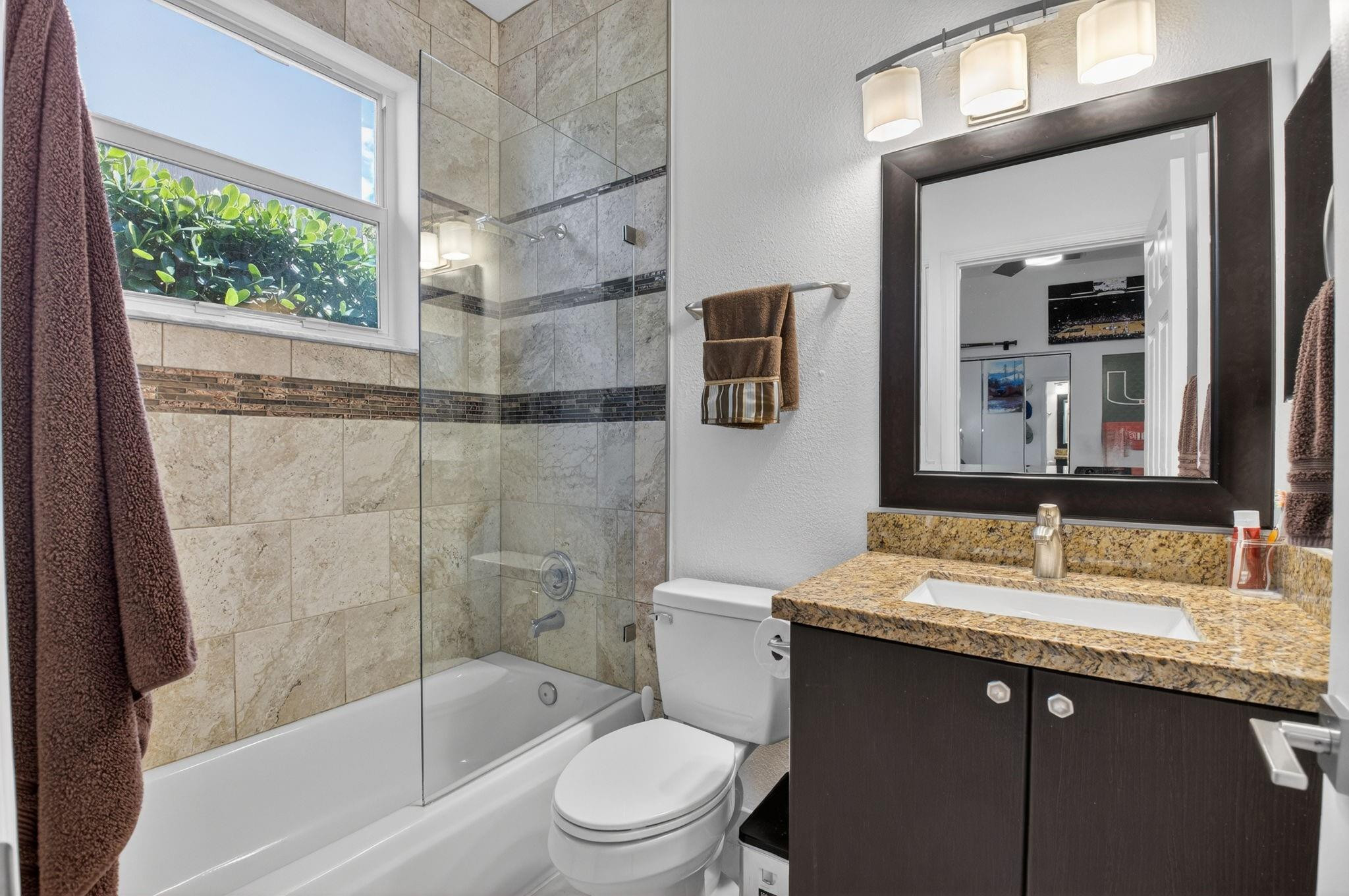 10078 Lexington Estates Boulevard Boca Raton, FL 33428 - Photo 26 of 49 a bathroom with a sink a toilet and shower
