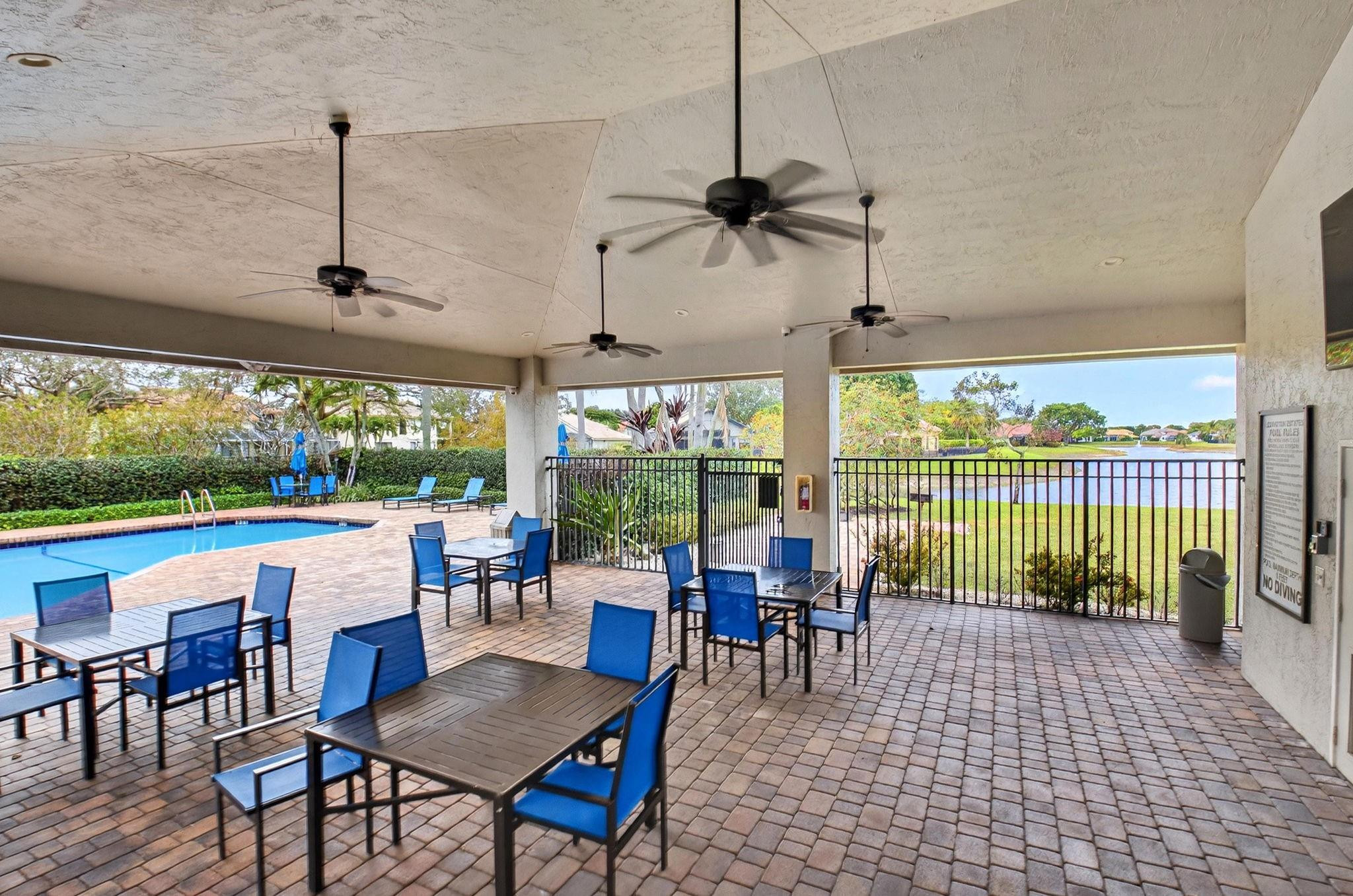 10078 Lexington Estates Boulevard Boca Raton, FL 33428 - Photo 47 of 49 a view of a dining room with furniture window and outside view