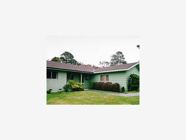 983 Customs Road Pebble Beach, CA 93953 - Photo 1 of 1 a view of a house with a backyard and plants