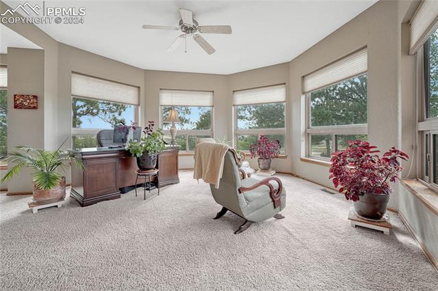 2690 Spaatz Road Monument, CO 80132 - Photo 4 of 50 Sunroom / solarium with ceiling fan