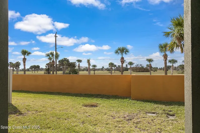 a view of a big room with an ocean view