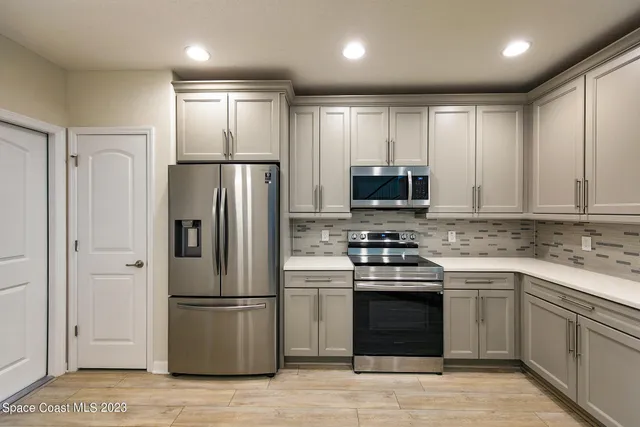 a kitchen with counter top space and a sink