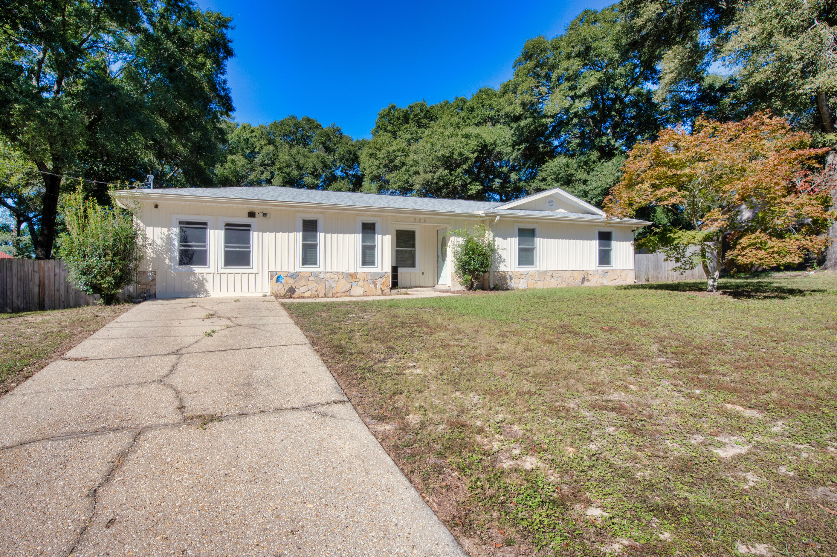 226 Springwood Circle Crestview, FL 32536 - Photo 1 of 27 front view of a house with a yard