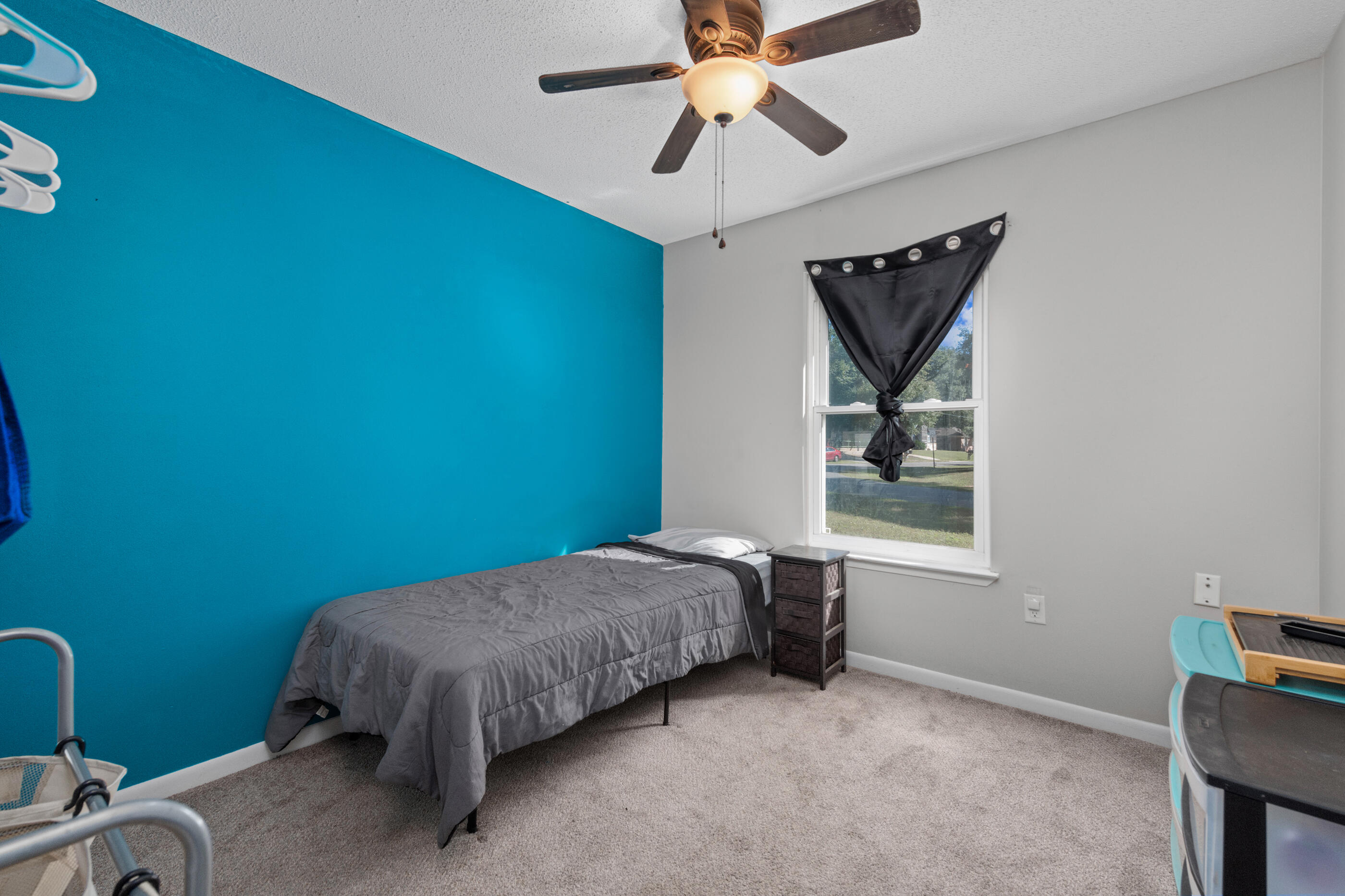 226 Springwood Circle Crestview, FL 32536 - Photo 11 of 27 a room with a bed and a window