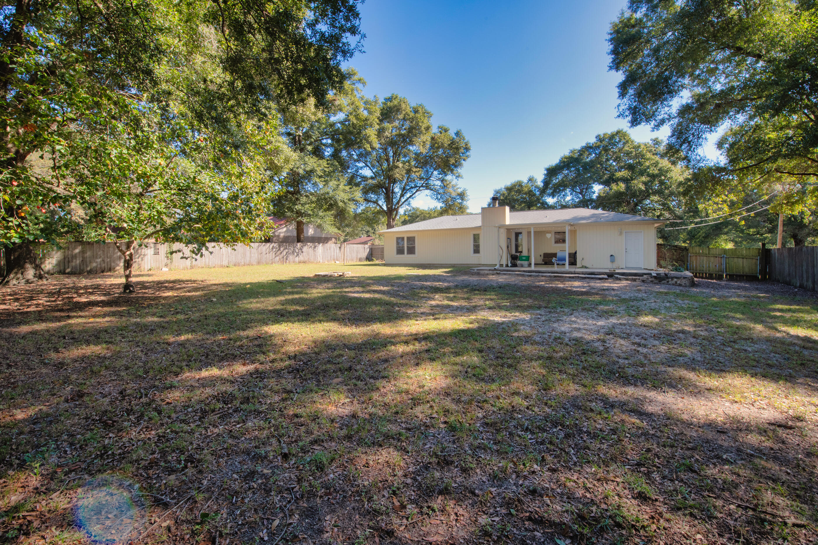 226 Springwood Circle Crestview, FL 32536 - Photo 20 of 27 a view of a house with a yard