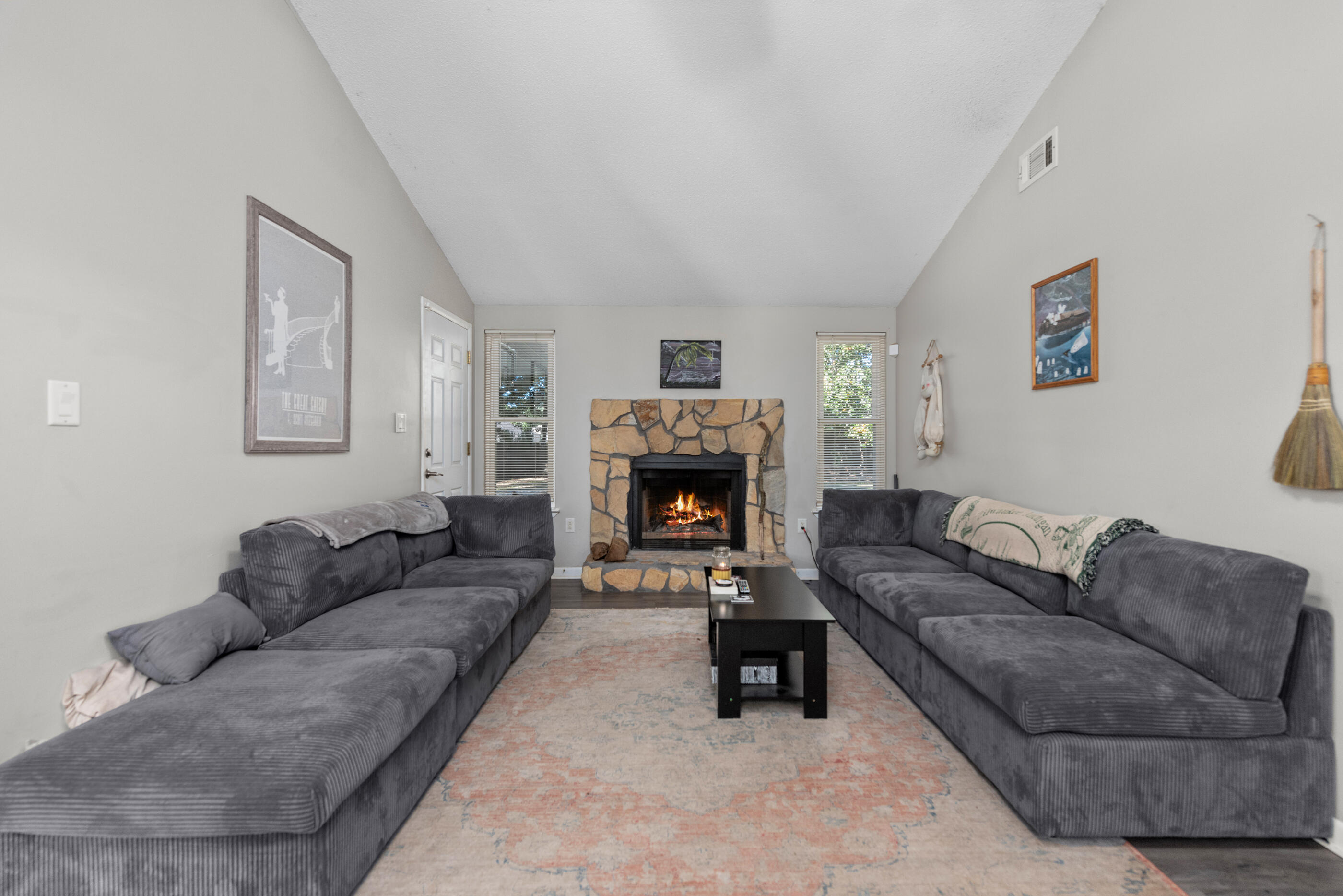 226 Springwood Circle Crestview, FL 32536 - Photo 3 of 27 a living room with furniture and a fireplace