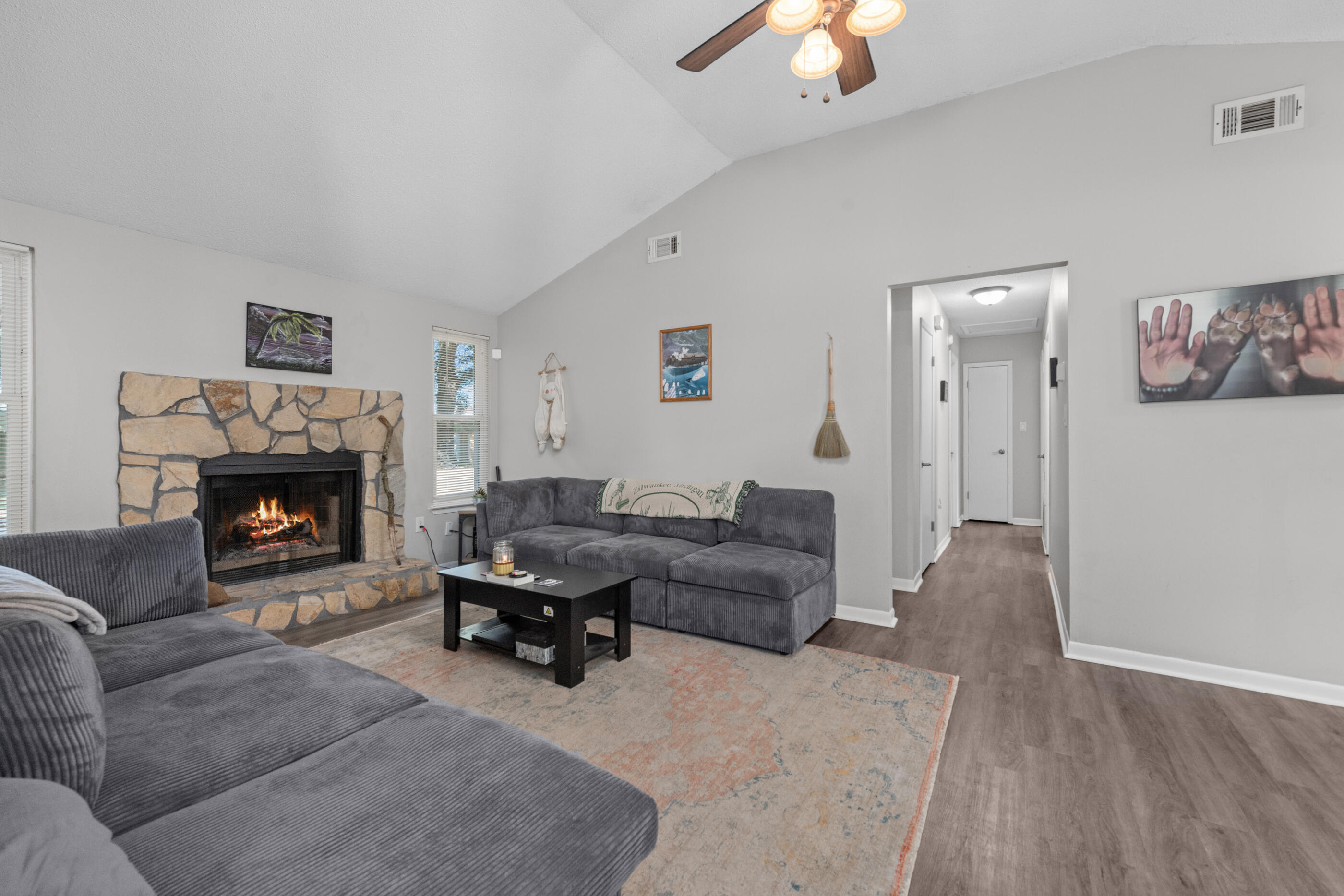 226 Springwood Circle Crestview, FL 32536 - Photo 4 of 27 a living room with furniture and a fireplace