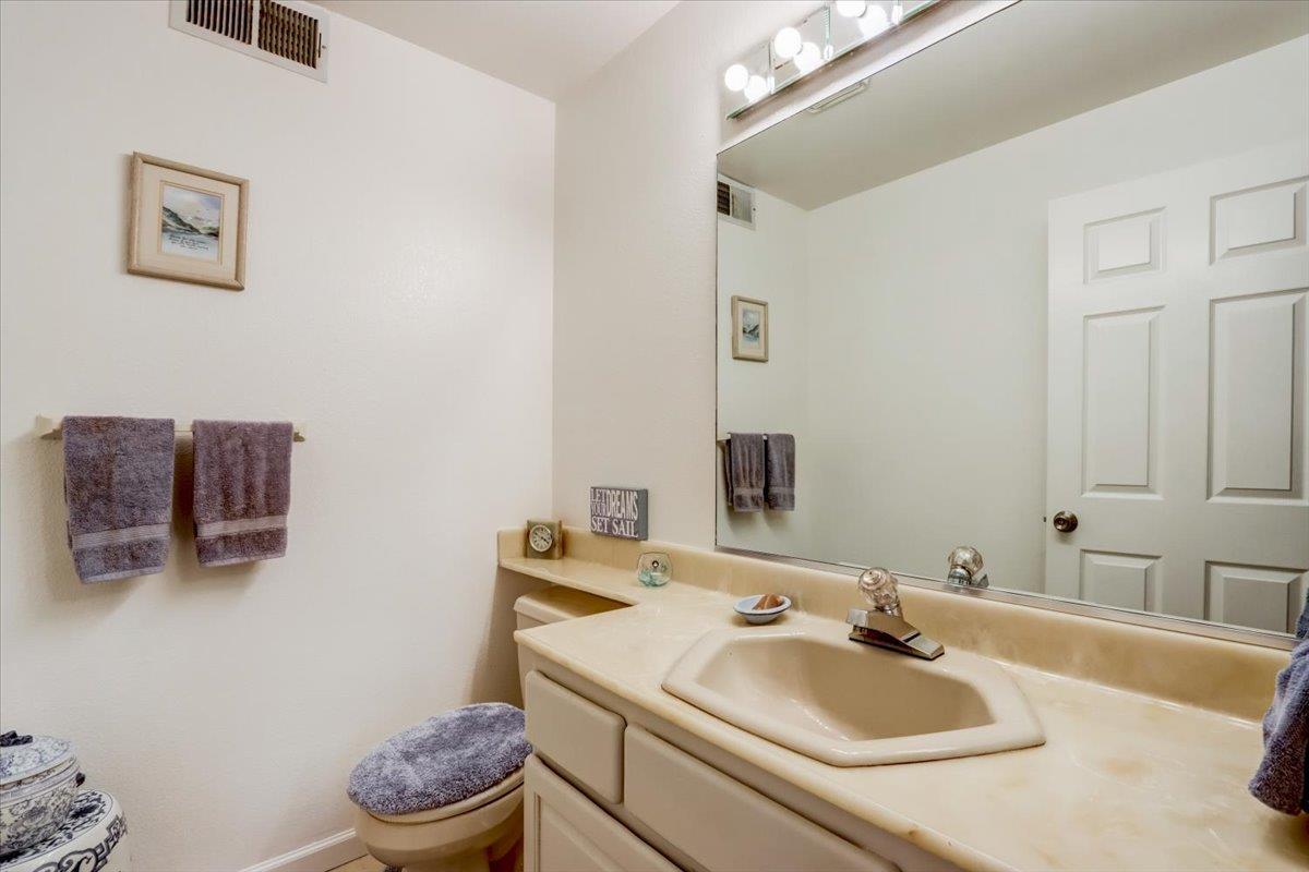 952 Corbel Common Fremont, CA 94539 - Photo 20 of 50 a bathroom with a sink and a toilet