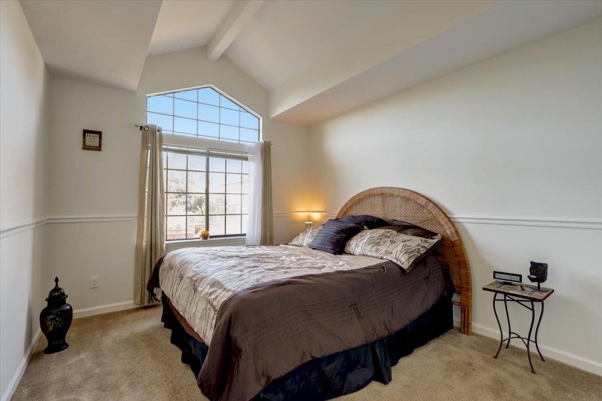 952 Corbel Common Fremont, CA 94539 - Photo 25 of 50 a bedroom with a bed and a window