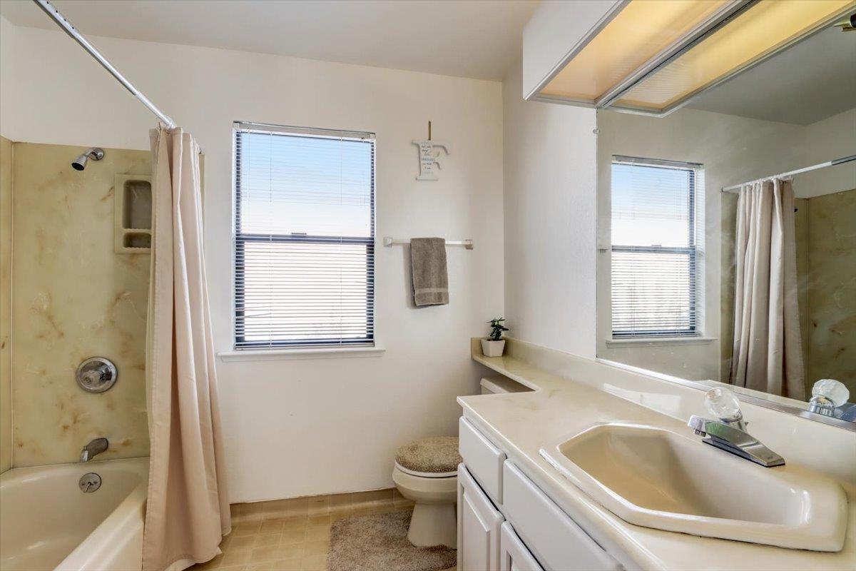 952 Corbel Common Fremont, CA 94539 - Photo 29 of 50 a bathroom with a granite countertop sink toilet and shower