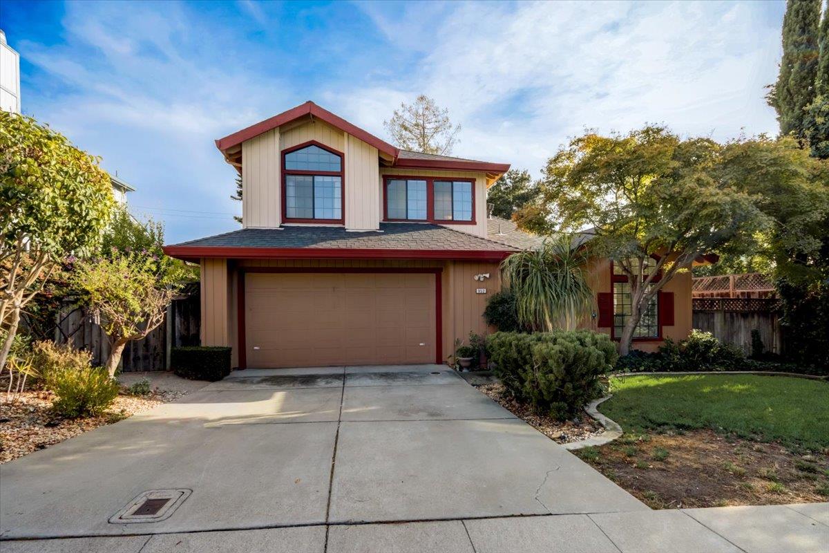 952 Corbel Common Fremont, CA 94539 - Photo 32 of 50 a front view of a house with a garden