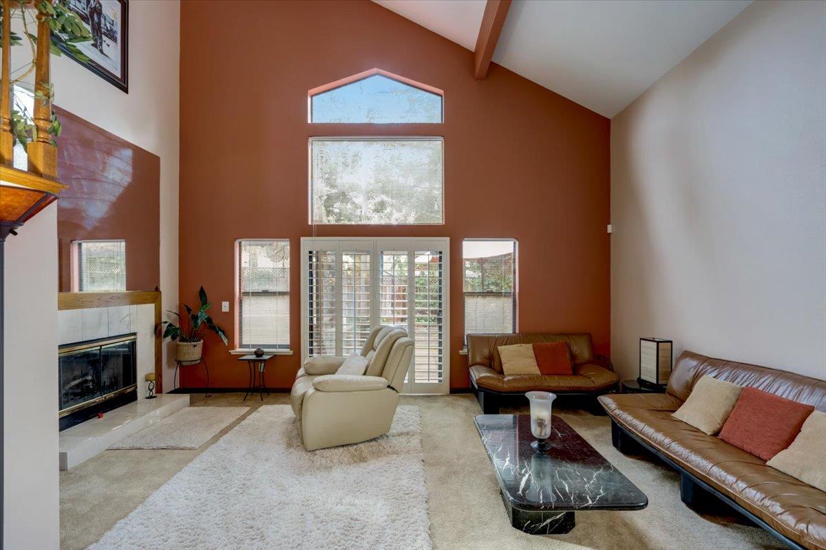 952 Corbel Common Fremont, CA 94539 - Photo 5 of 50 a living room with furniture and a fireplace