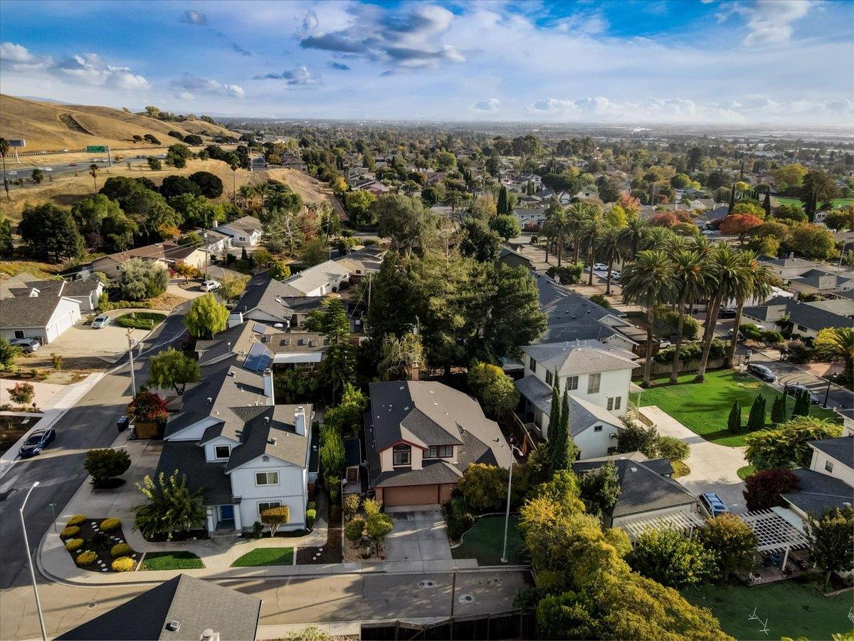 952 Corbel Common Fremont, CA 94539 - Photo 44 of 50 an aerial view of residential houses with outdoor space