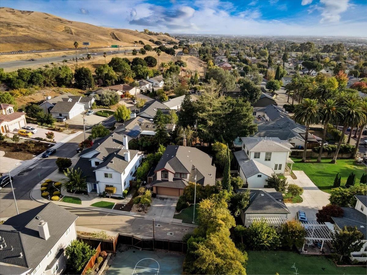 952 Corbel Common Fremont, CA 94539 - Photo 45 of 50 an aerial view of residential houses with outdoor space