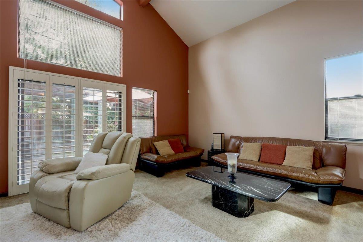 952 Corbel Common Fremont, CA 94539 - Photo 6 of 50 a living room with furniture and a large window