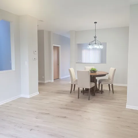a view of a dining room with furniture