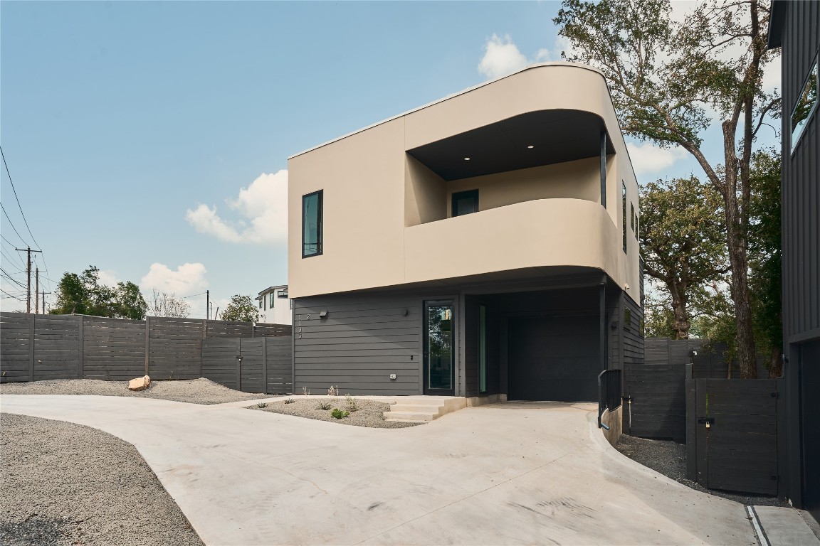 a front view of a house with a garage