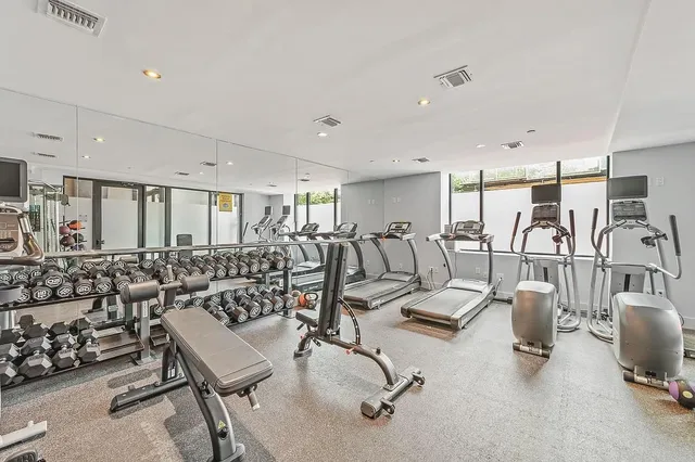 a view of a room with gym equipment