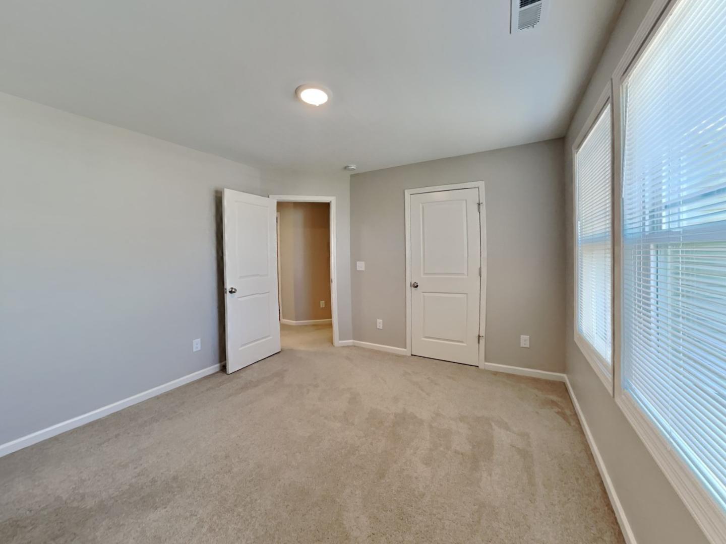 43 Wild Sage Circle Angier, NC 27501 - Photo 11 of 19 a view of an empty room and window